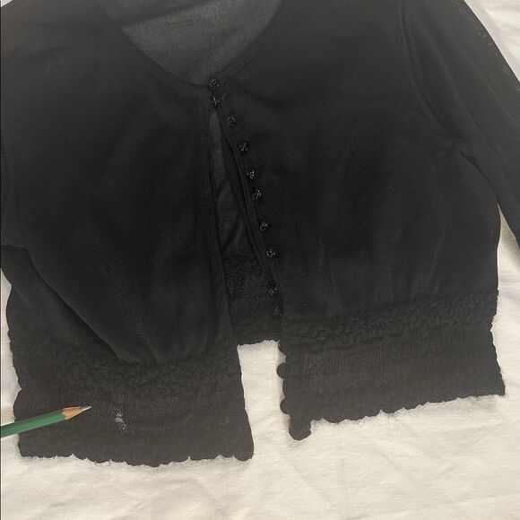 Authentic Black CHANEL Cropped Cardigan
P22387W03216 - Picture 15 of 16